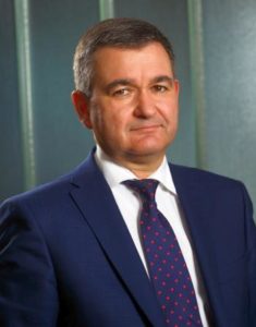 Valeriu Binig, EY