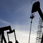 Oil set for third straight weekly gain